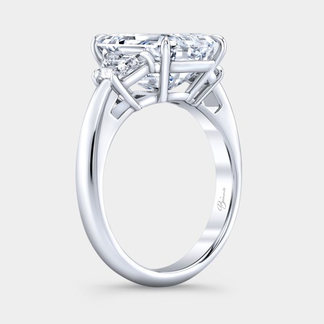 Platinum emerald diamond ring, 45 degree, trapezoid sides.