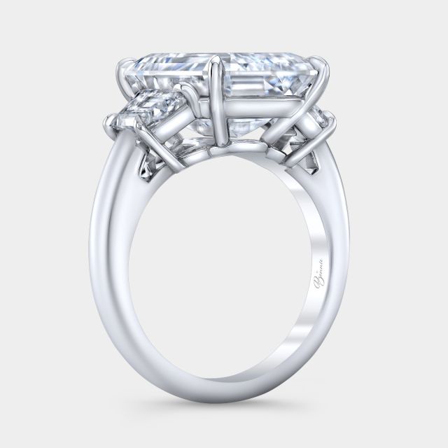 Platinum emerald diamond ring, 45 degree, trapezoid sides.