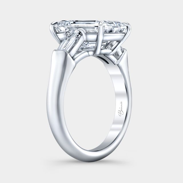 Platinum emerald diamond ring, 45 degree, baguette sides.