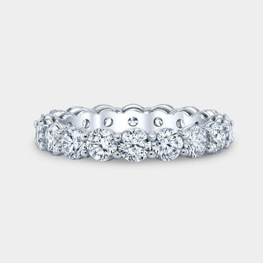 Platinum diamond band on hand, double gallery.