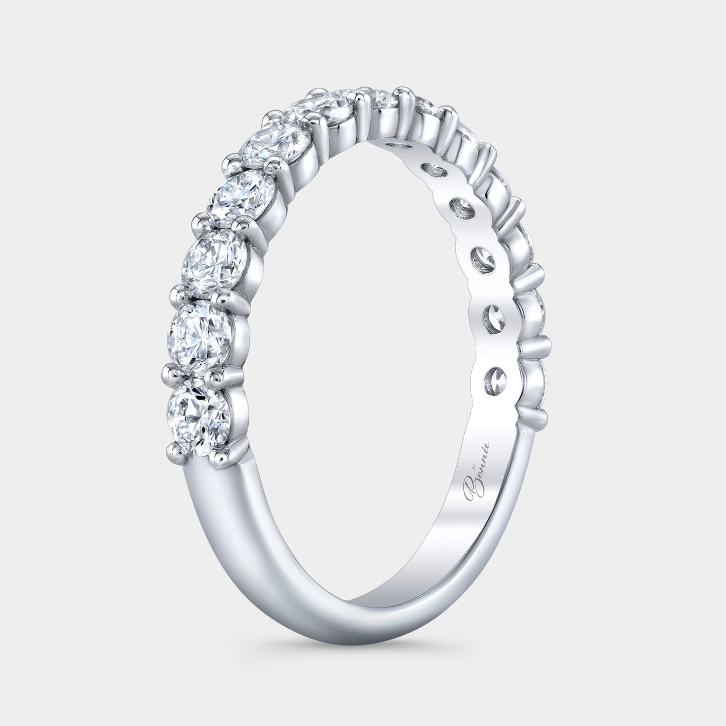 Platinum 1/2 Way Plus Wedding Band on Hand, Round Diamonds.