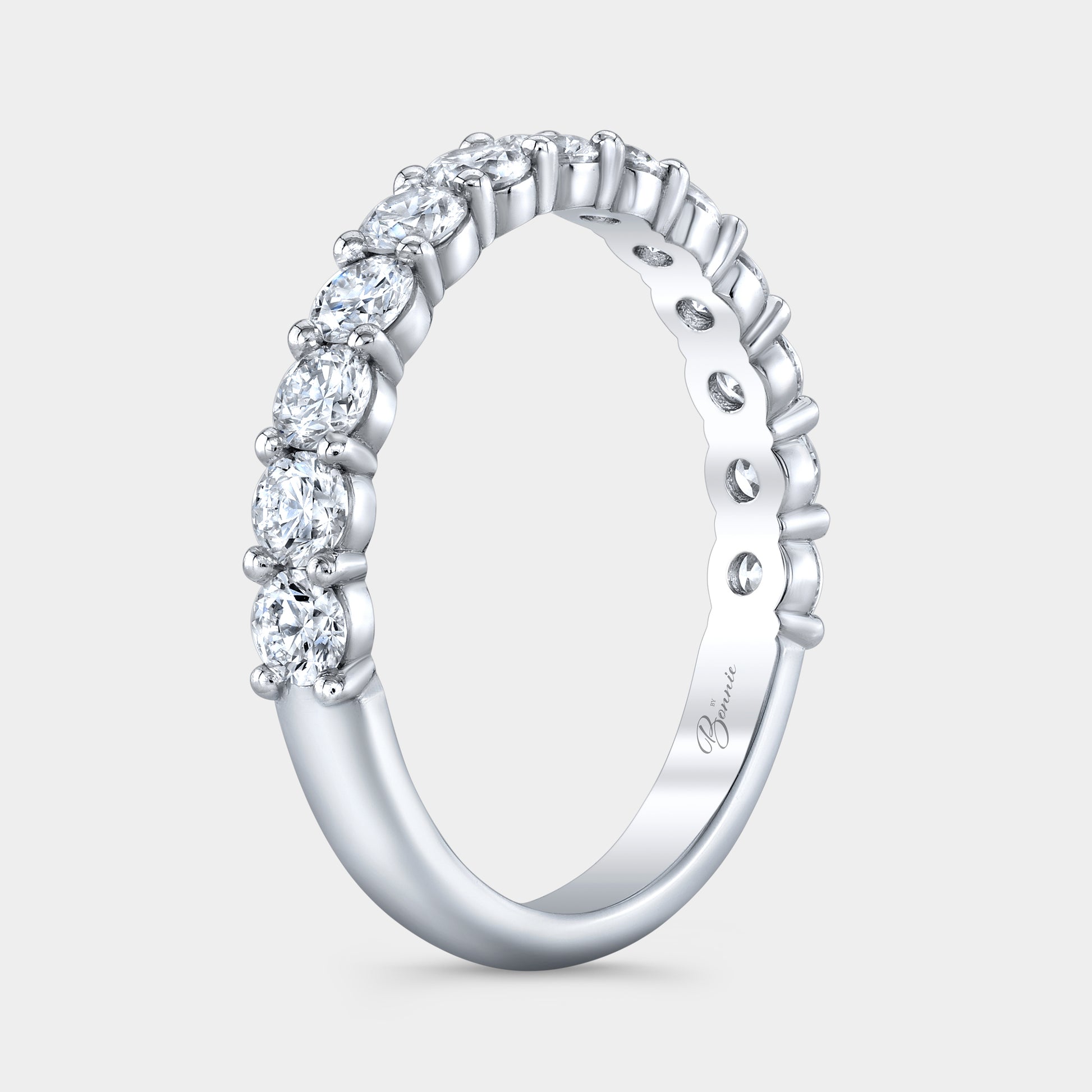 Platinum 1/2 Way Plus Wedding Band on Hand, Round Diamonds.