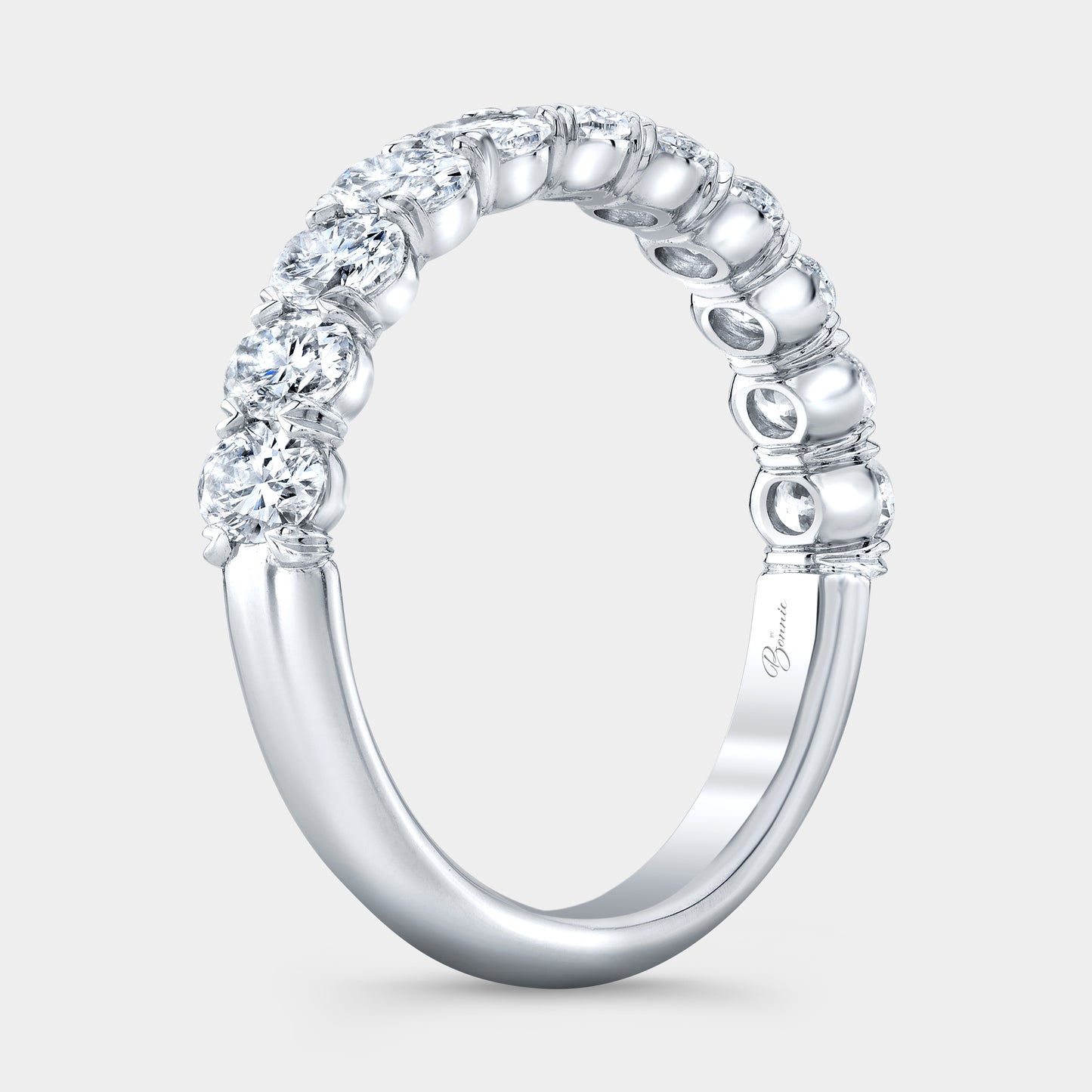 Platinum Petite Wedding Band on Hand, Oval Diamonds.