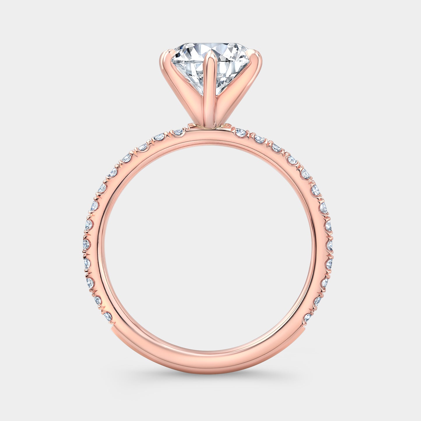 Rose gold ring, round diamond, U pave band.