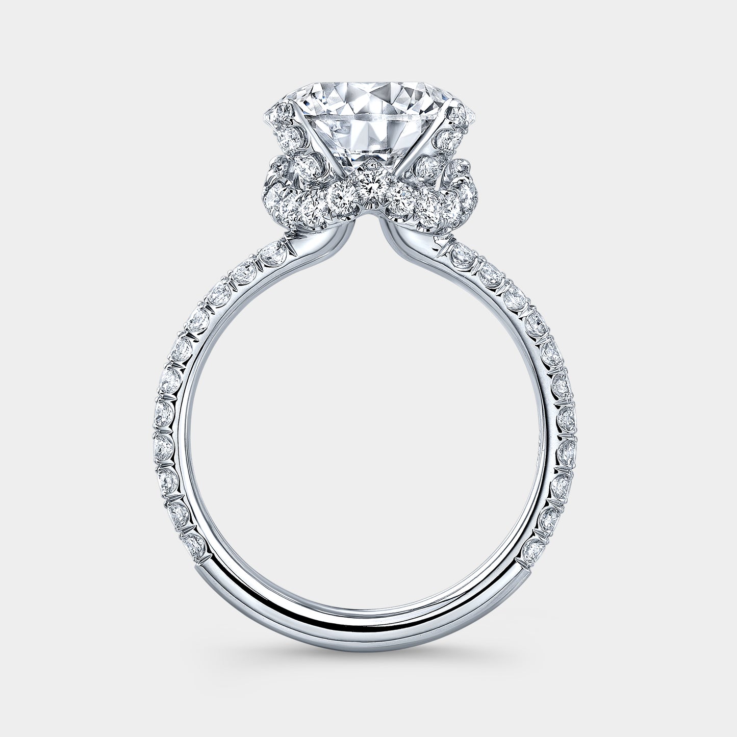 White gold ring, round diamond, double row U pave band.