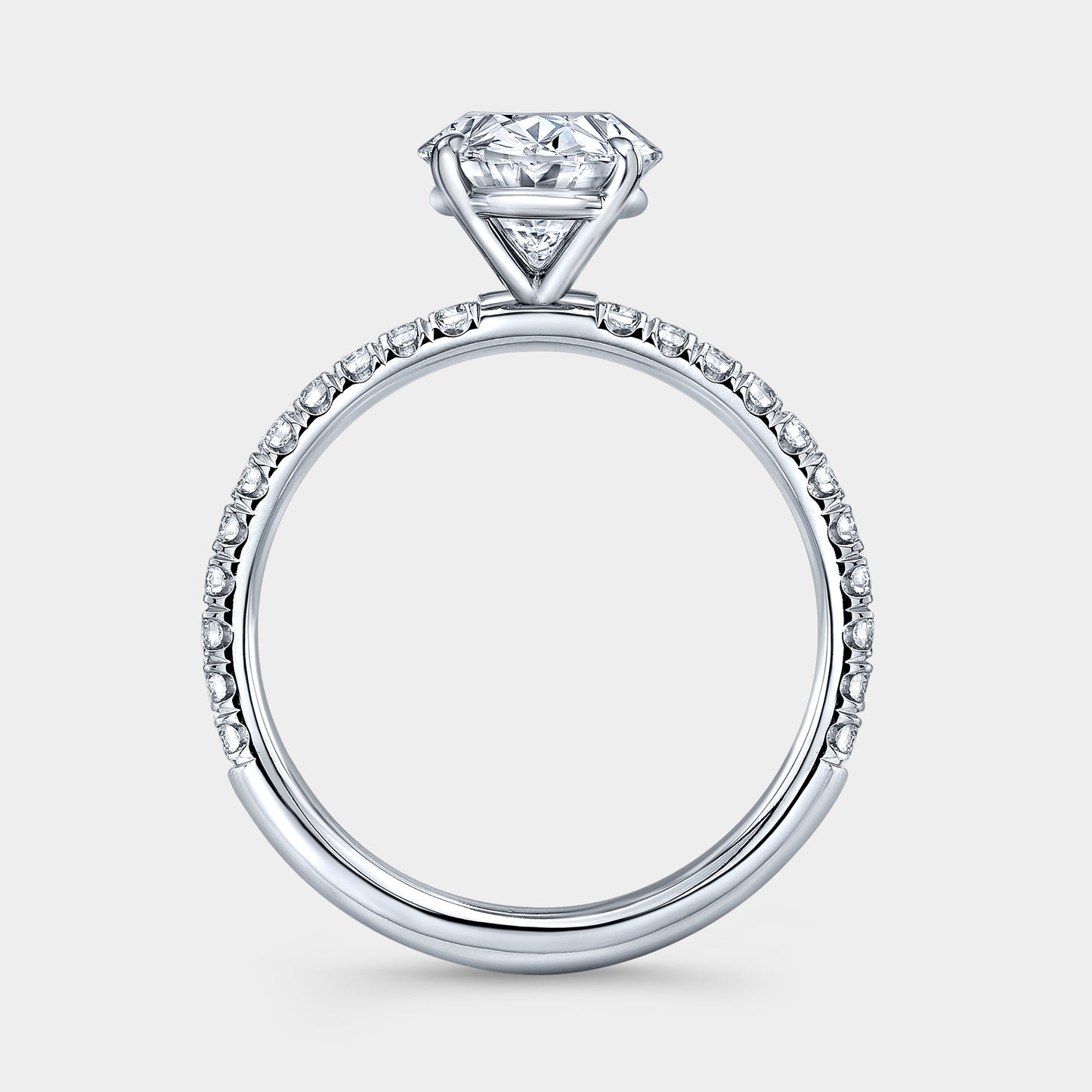 Platinum ring, oval diamond, U pave band.