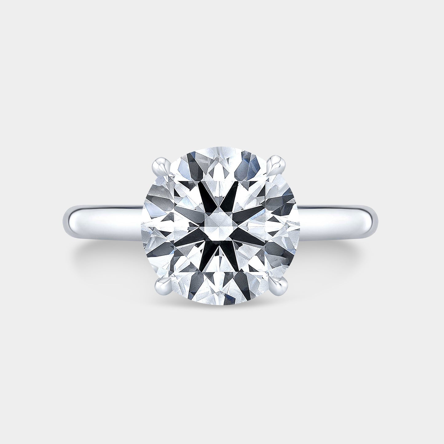Round diamond ring, 4 prong setting.