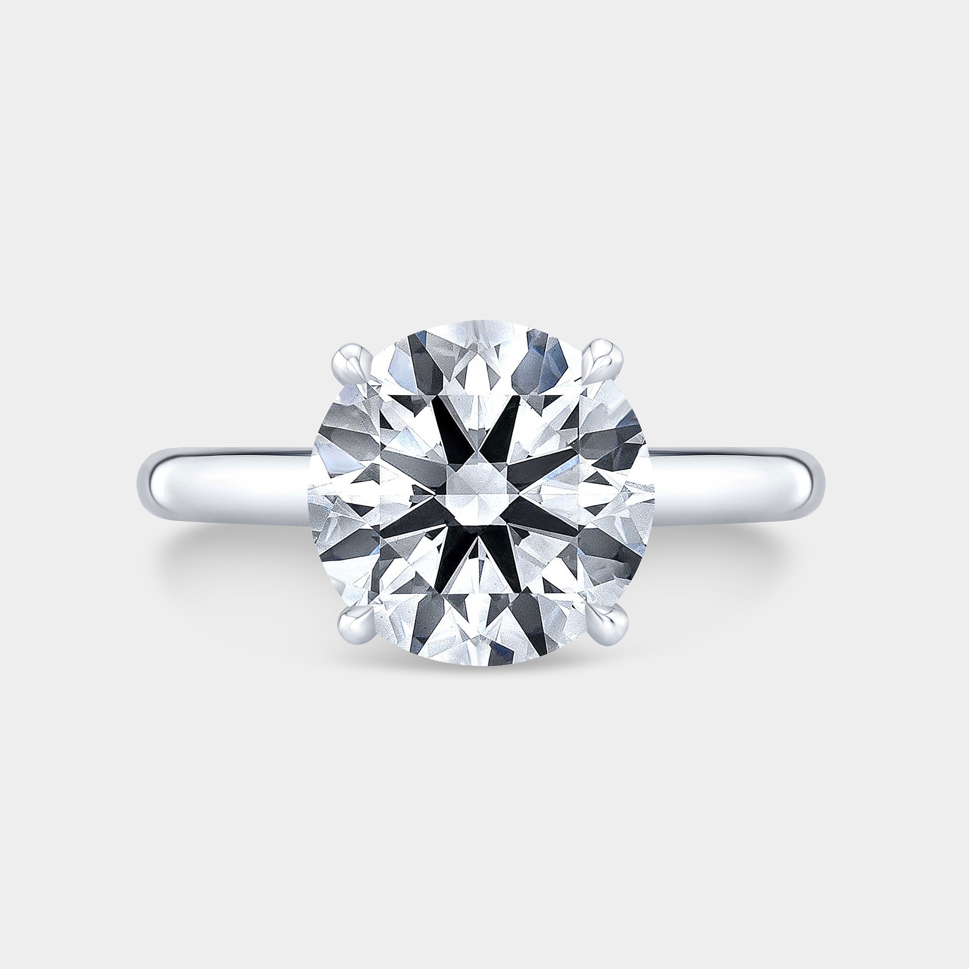 Round diamond ring, 4 prong setting.