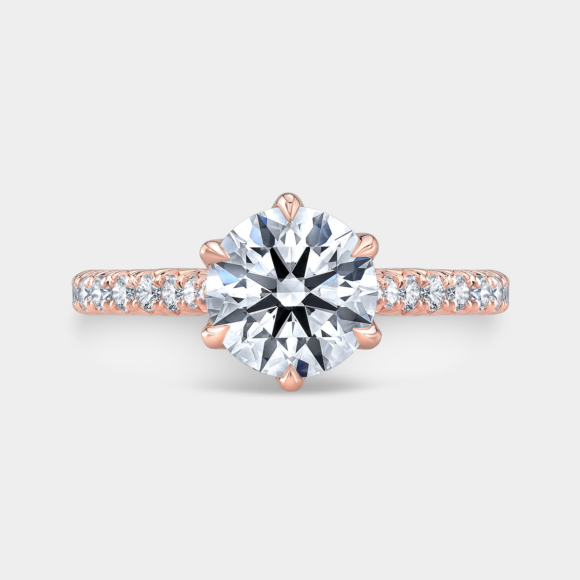 Rose gold round ring, top view, tulip pave.