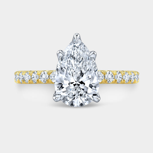 Pear ring, top down, tulip pave solitaire.