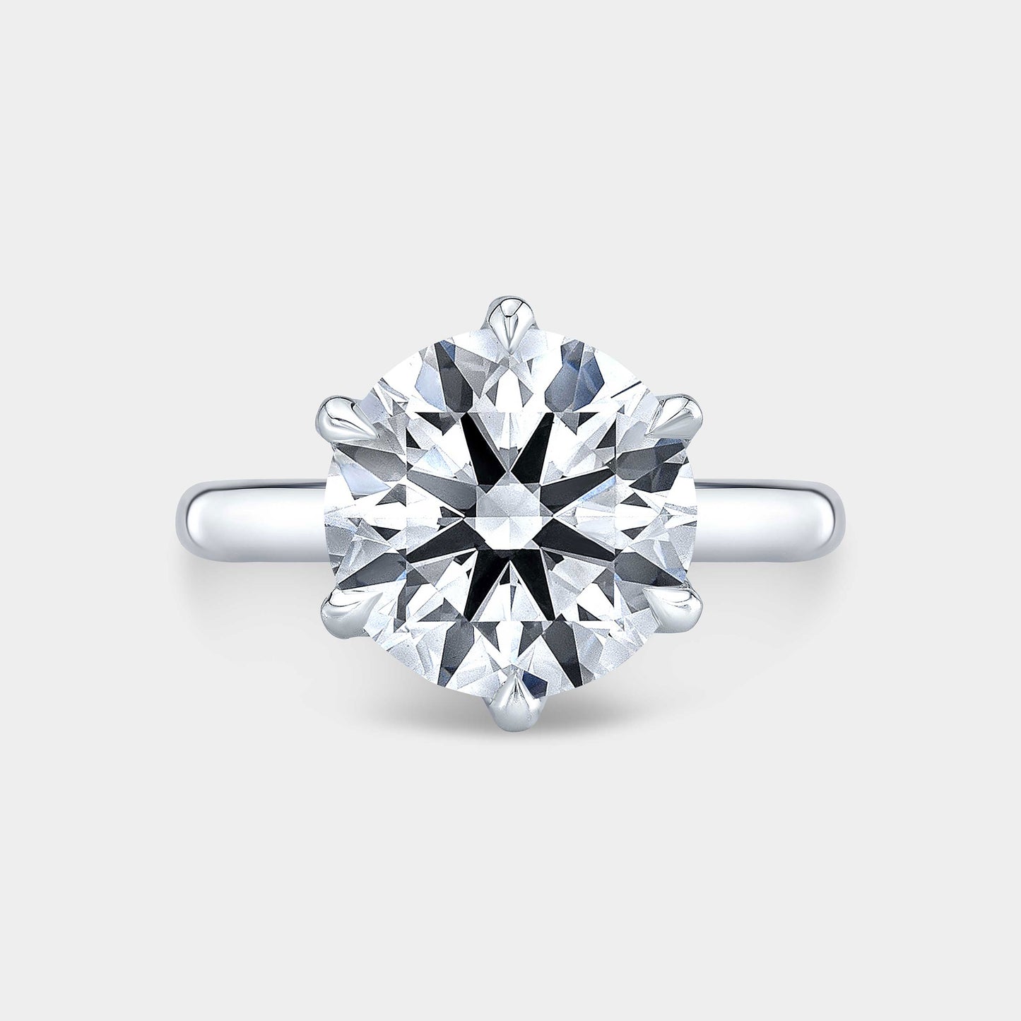 Ring, top-down angle, full diamond basket detail.