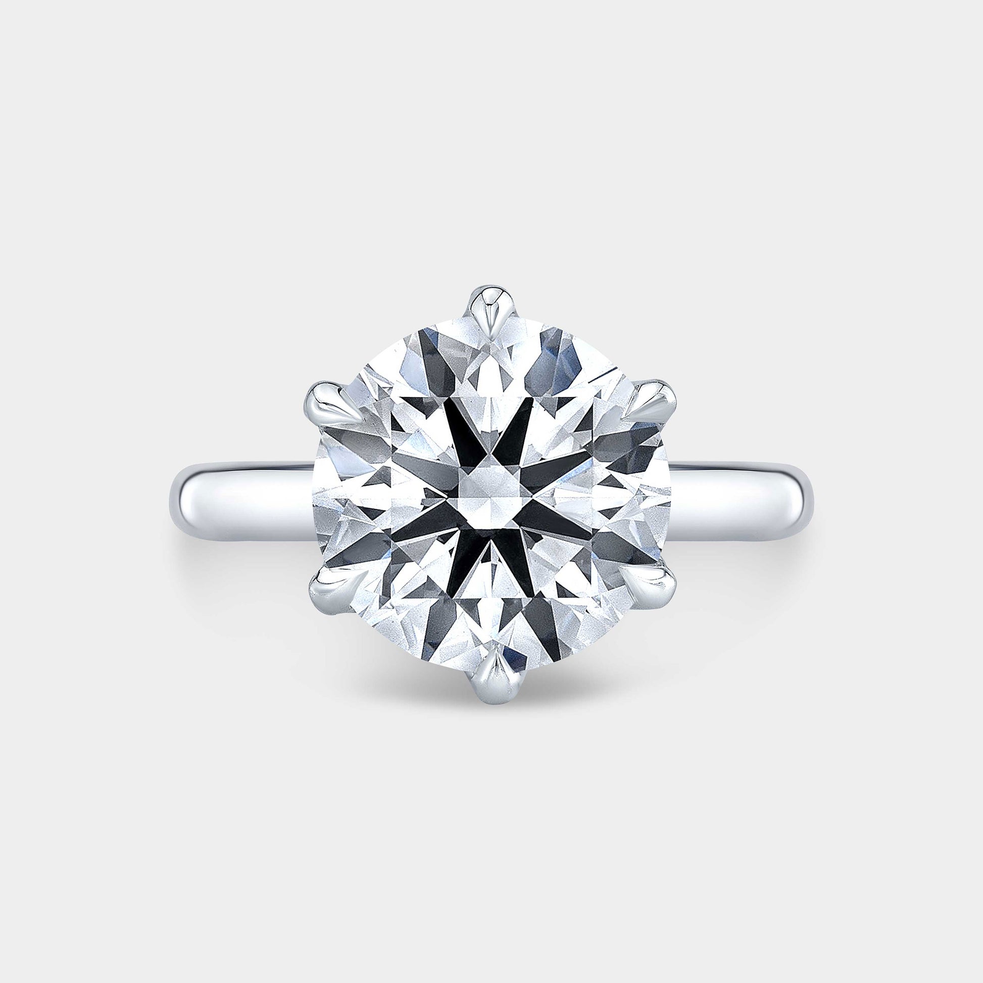 Ring, top-down angle, full diamond basket detail.