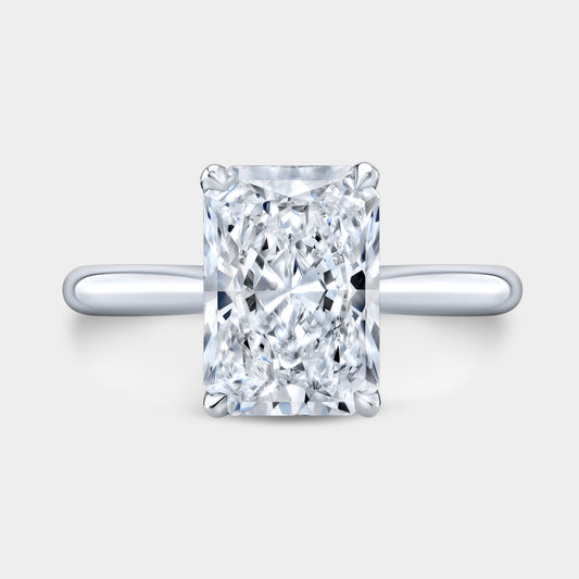 3ct radiant engagement ring, white gold band.