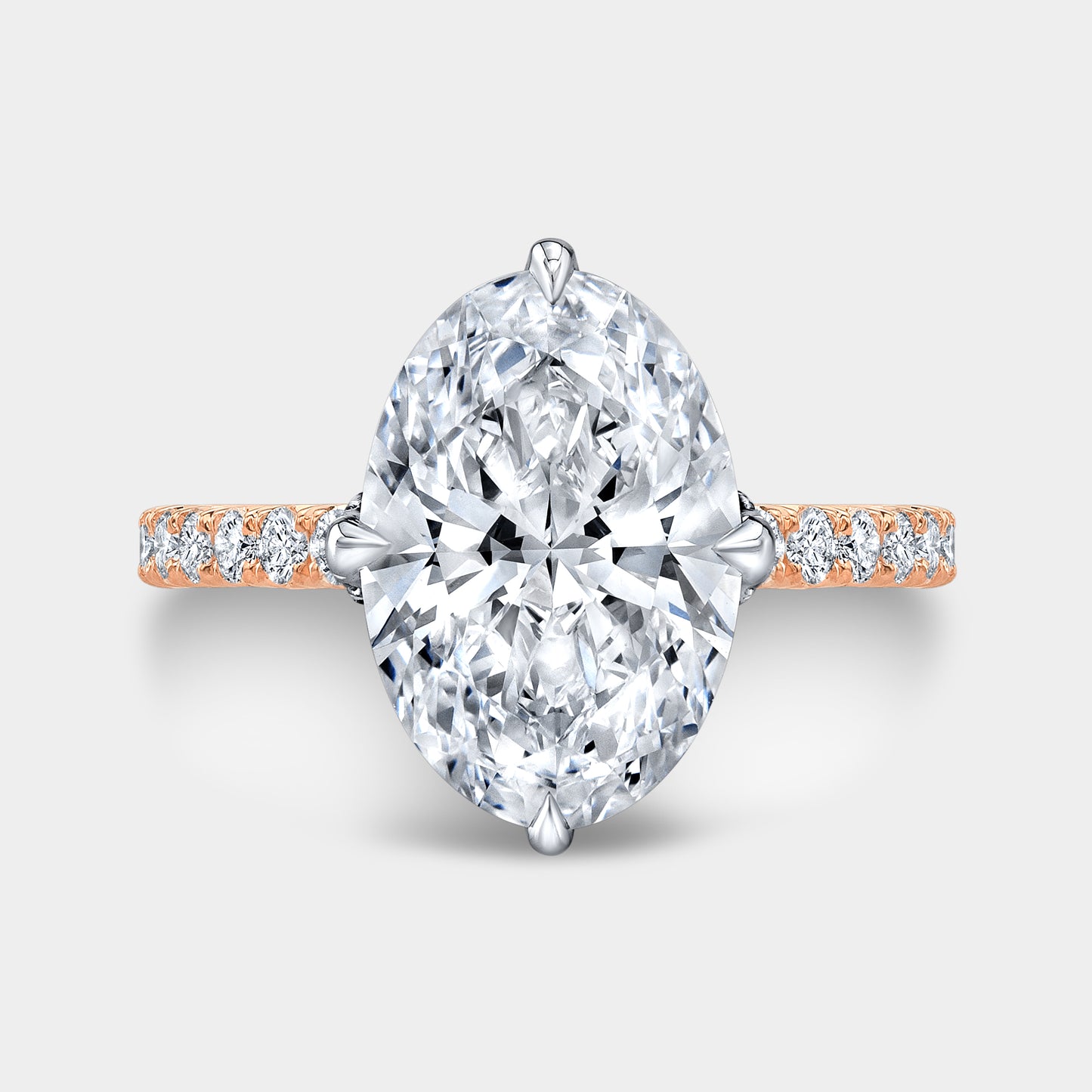 Two tone oval ring, top view, tulip pave.