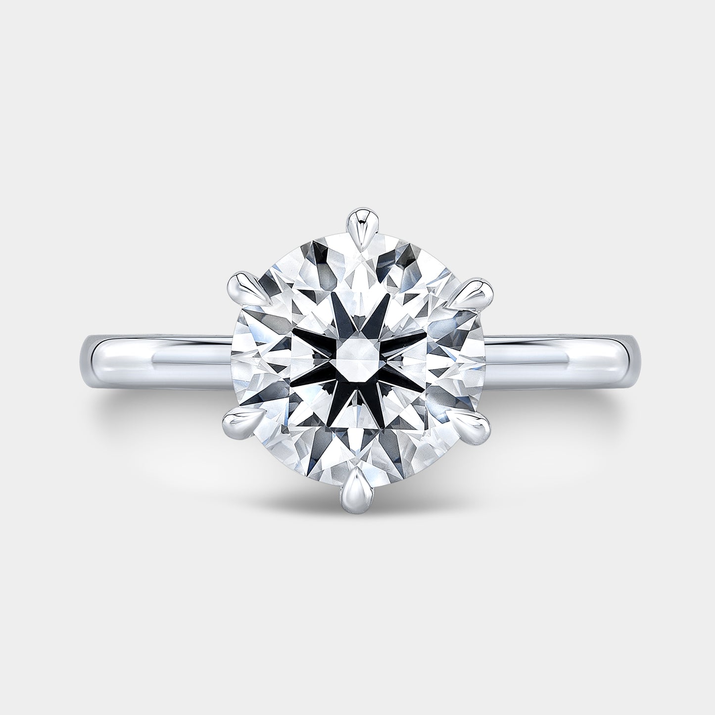 Platinum round ring, top view, hidden halo.