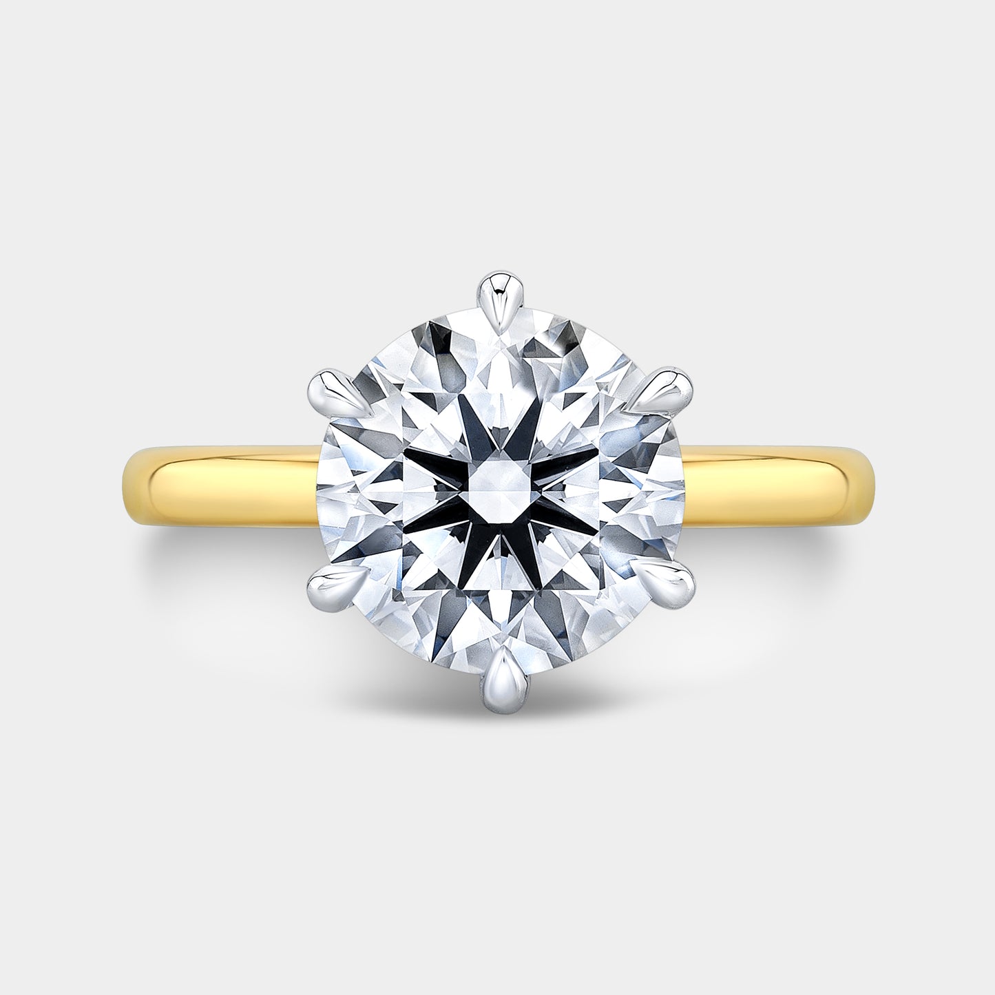 Two tone round ring, top view, hidden halo.