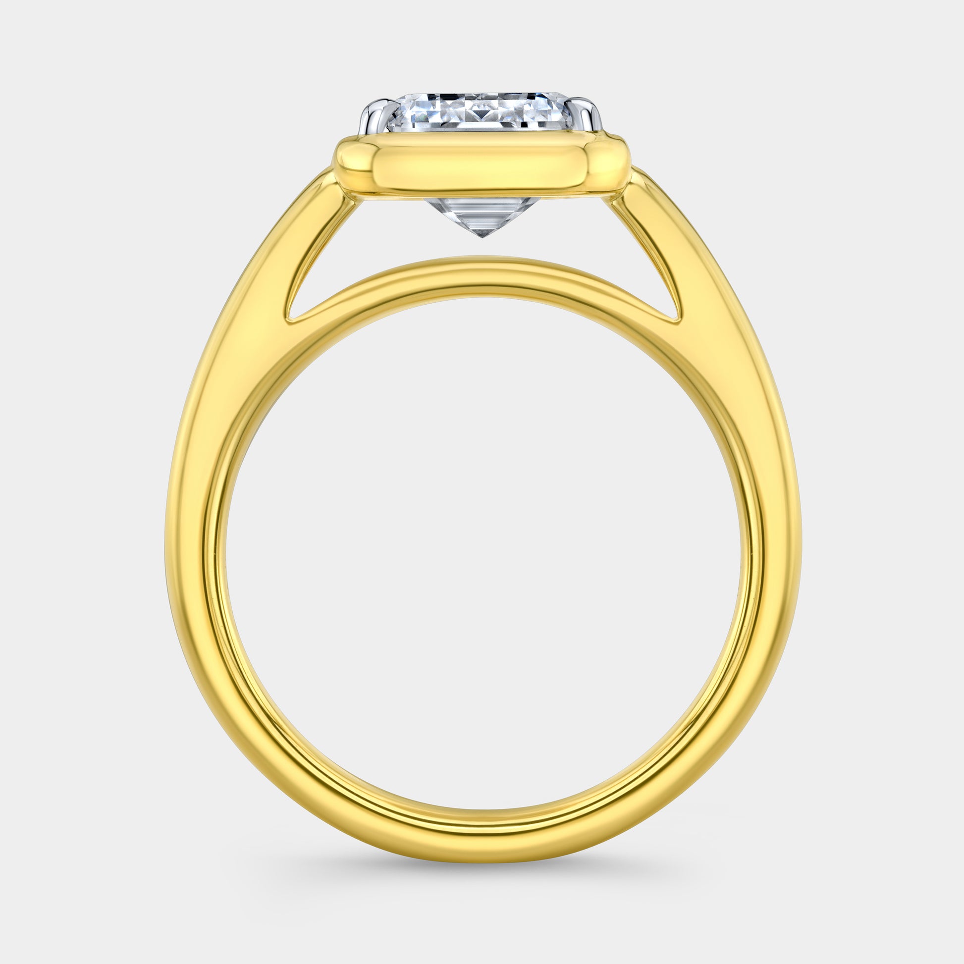 Emerald solitaire ring, yellow gold & platinum, bezel.