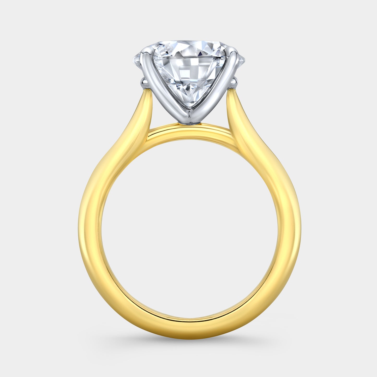 Round solitaire ring, yellow gold & platinum, 4 prong.