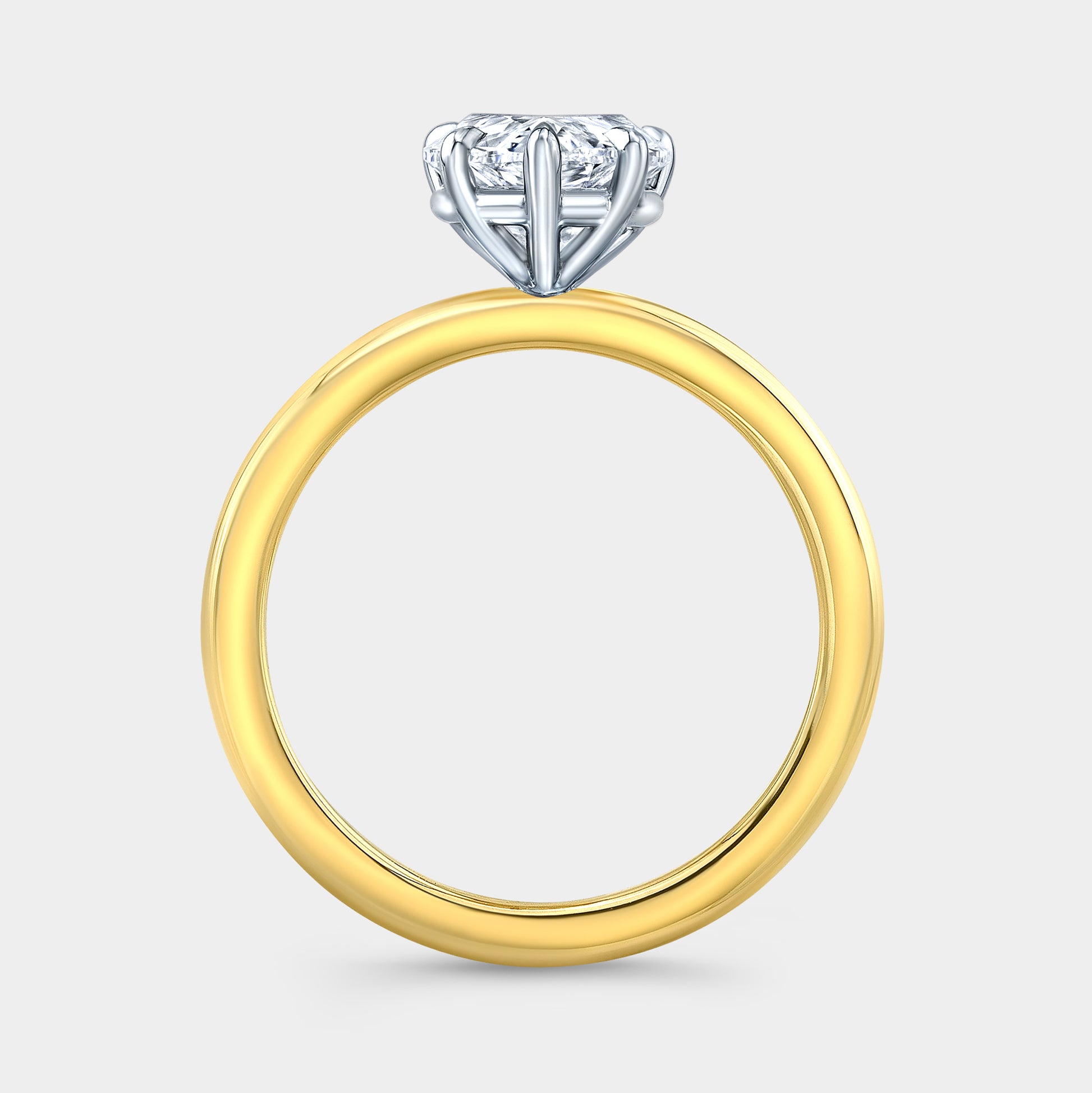 Two tone pear ring, solitaire setting.