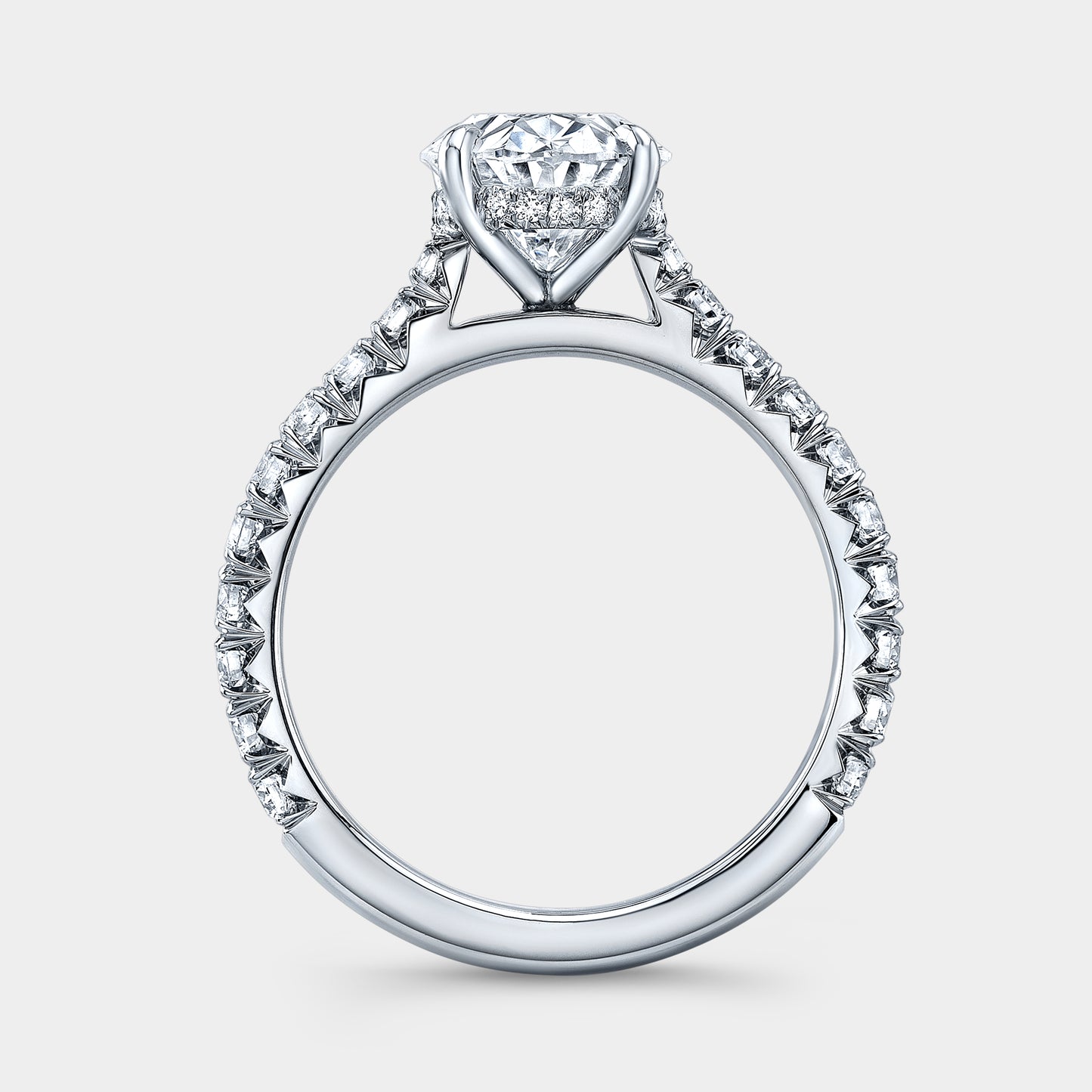 White gold ring, cathedral setting and pave detail.