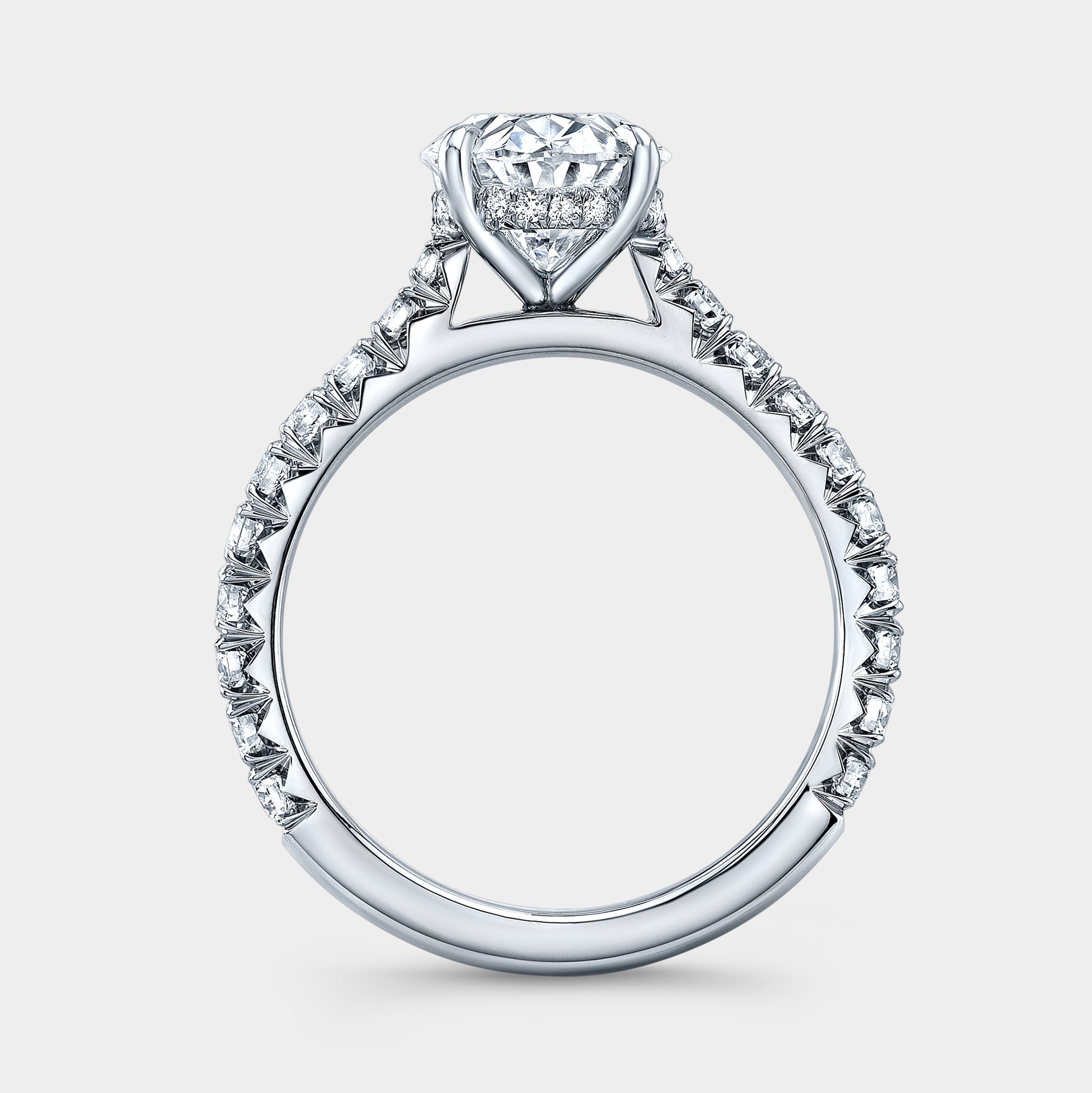 White gold ring, cathedral setting and pave detail.