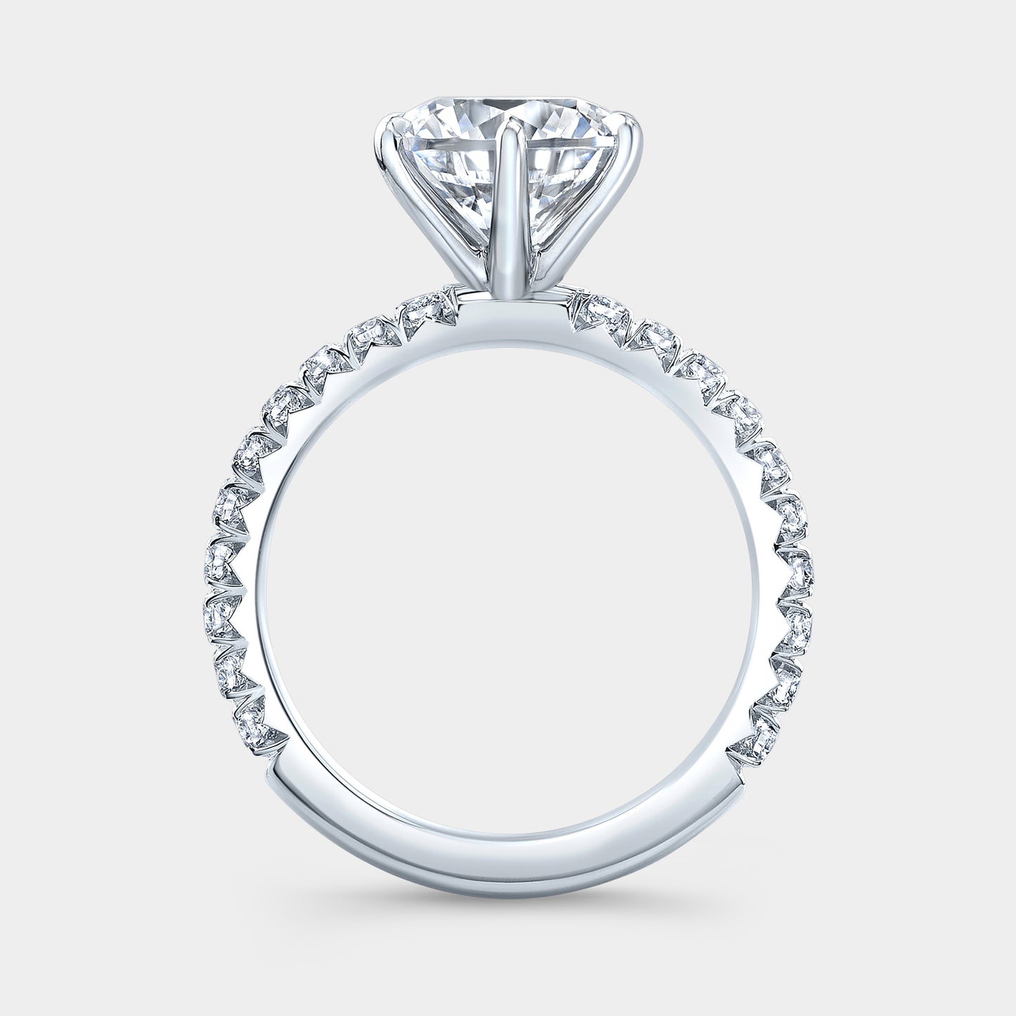 Platinum round diamond ring, 6 prongs, pave band.