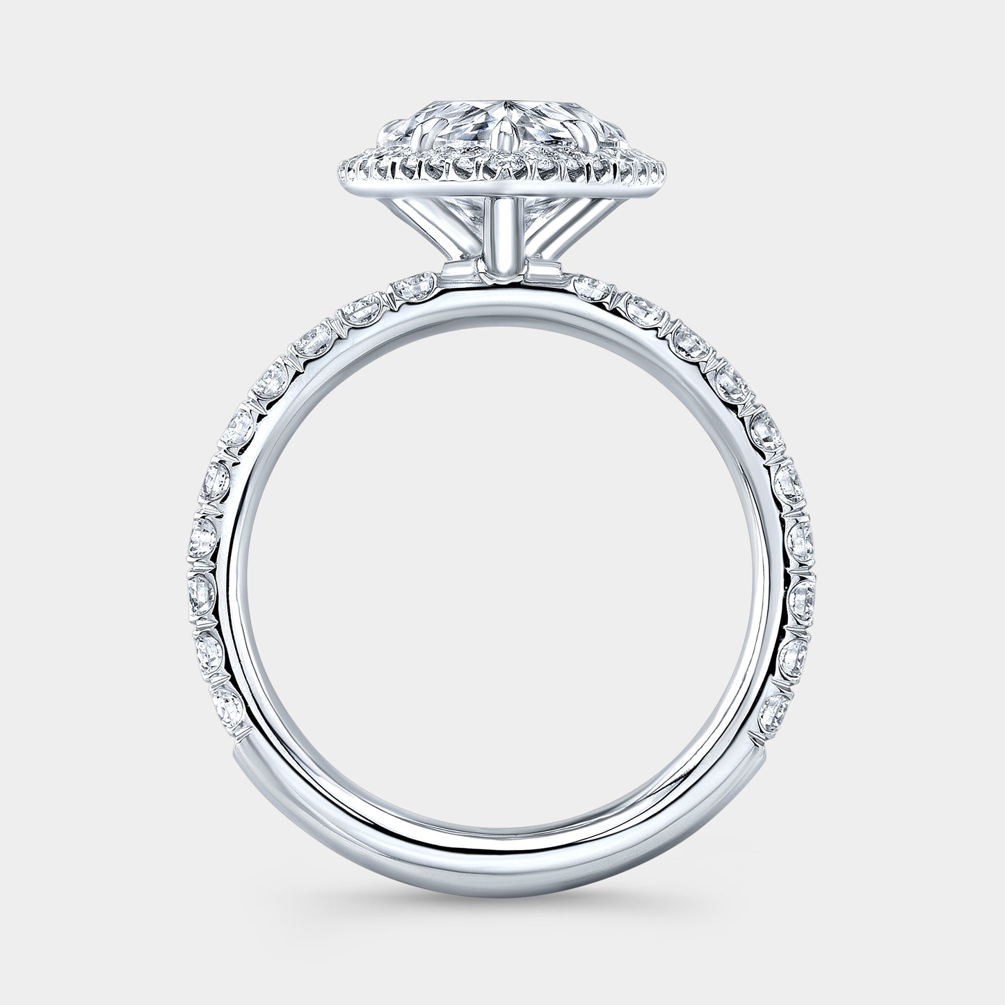 White gold ring, U pave band and halo detail.