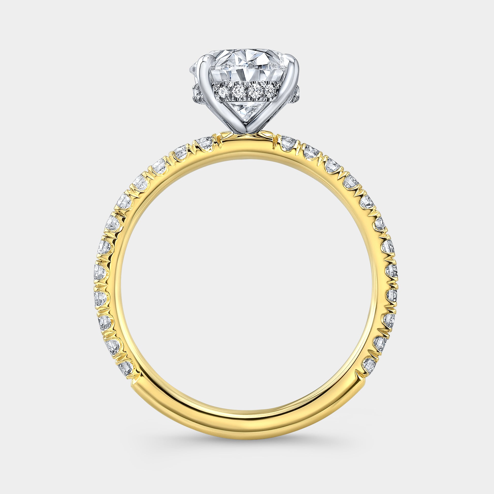 Oval halo ring, yellow gold & platinum, U pave.