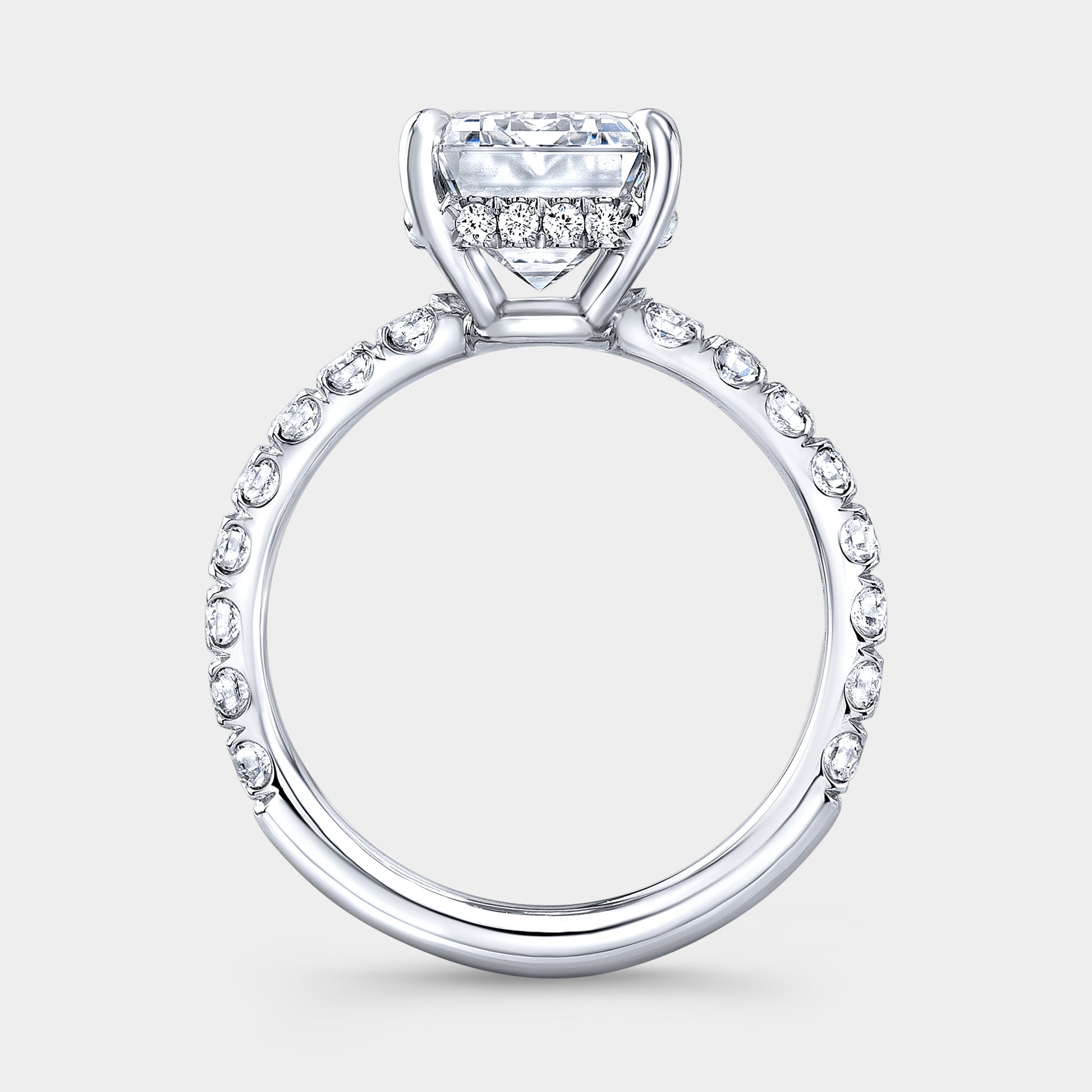 White gold ring, U pave setting and halo detail.