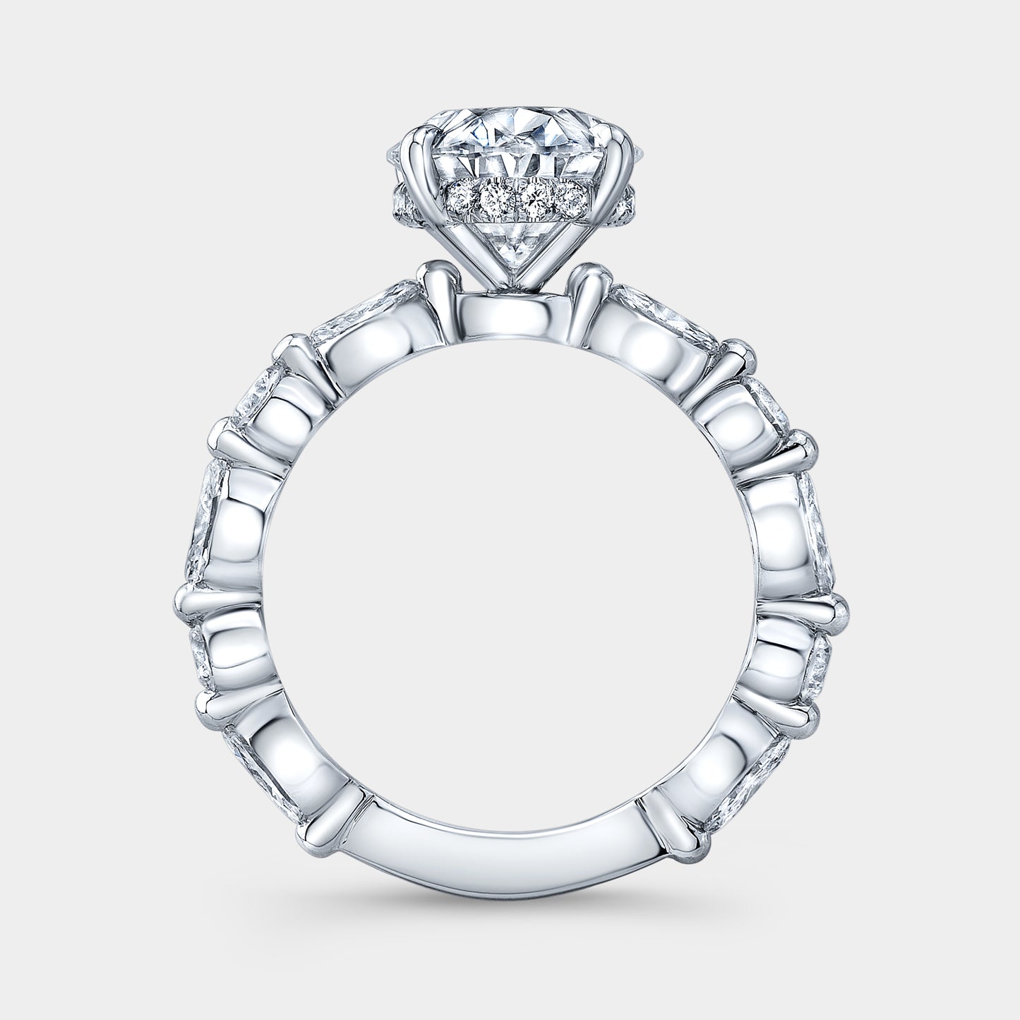 White gold ring, marquise and round accents.