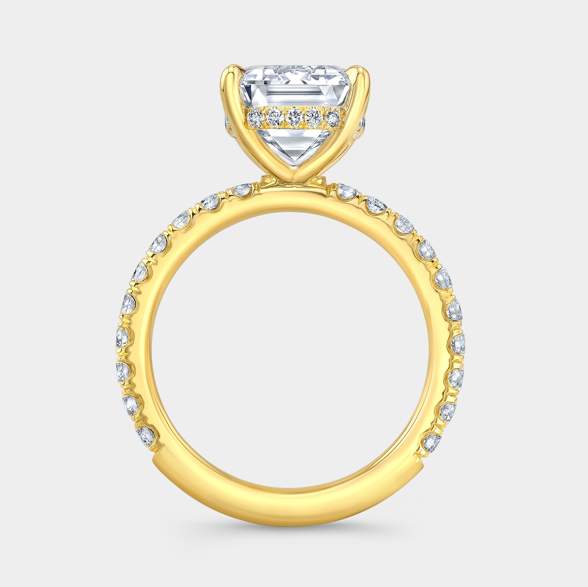 Yellow gold emerald diamond ring, U pave, hidden halo.