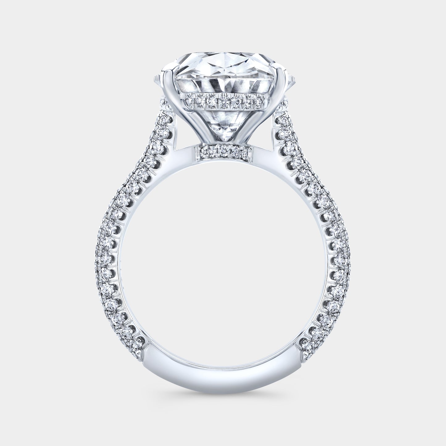 Diamond ring, side view, 3 row pave and prongs.