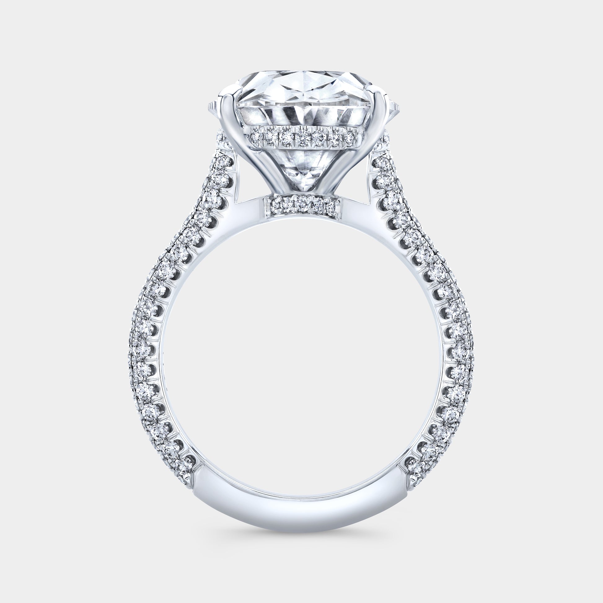Diamond ring, side view, 3 row pave and prongs.