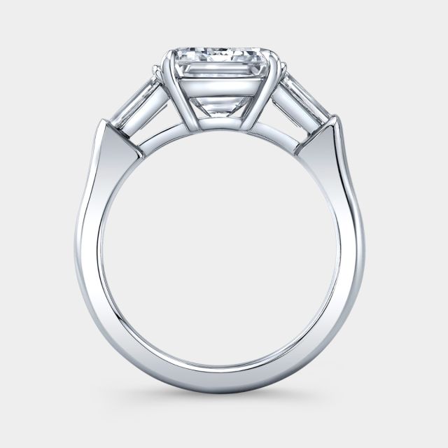 Platinum emerald diamond ring, baguette sides, 3 stone.