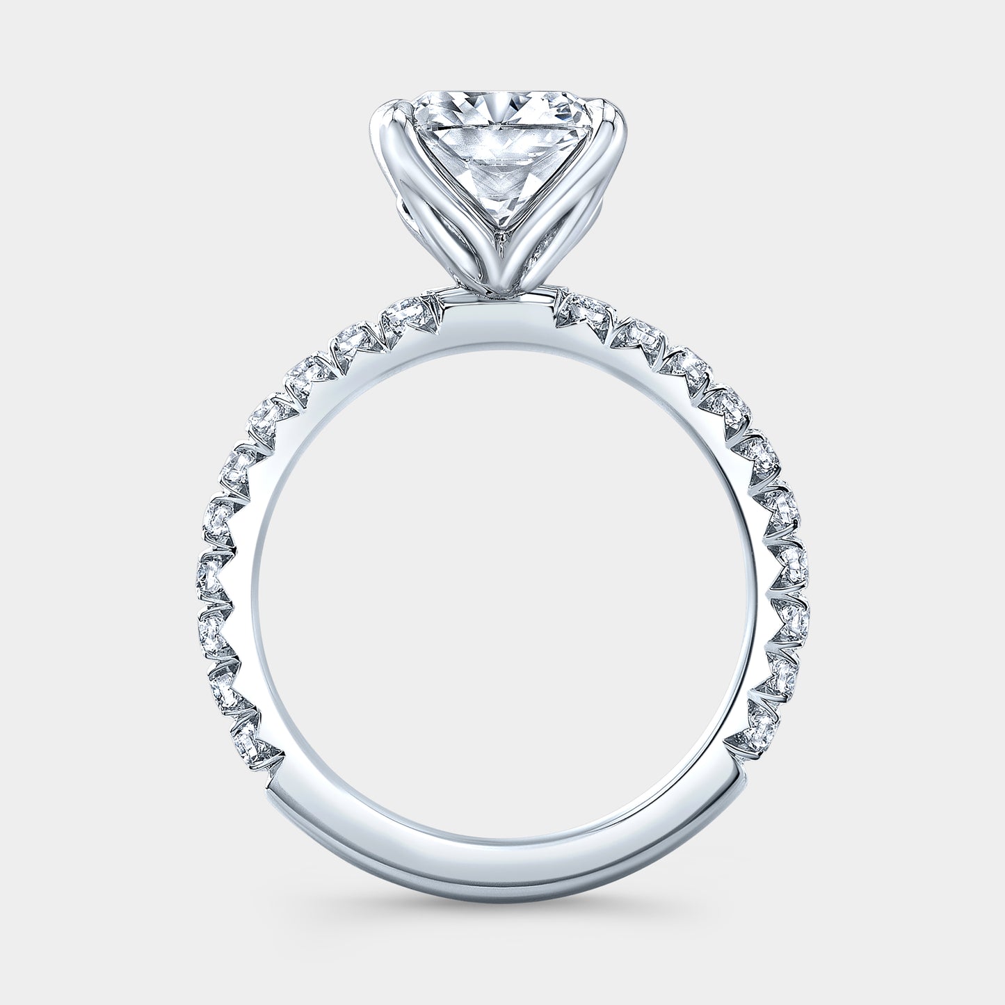 White gold ring, cushion diamond, tulip basket, French pave band.