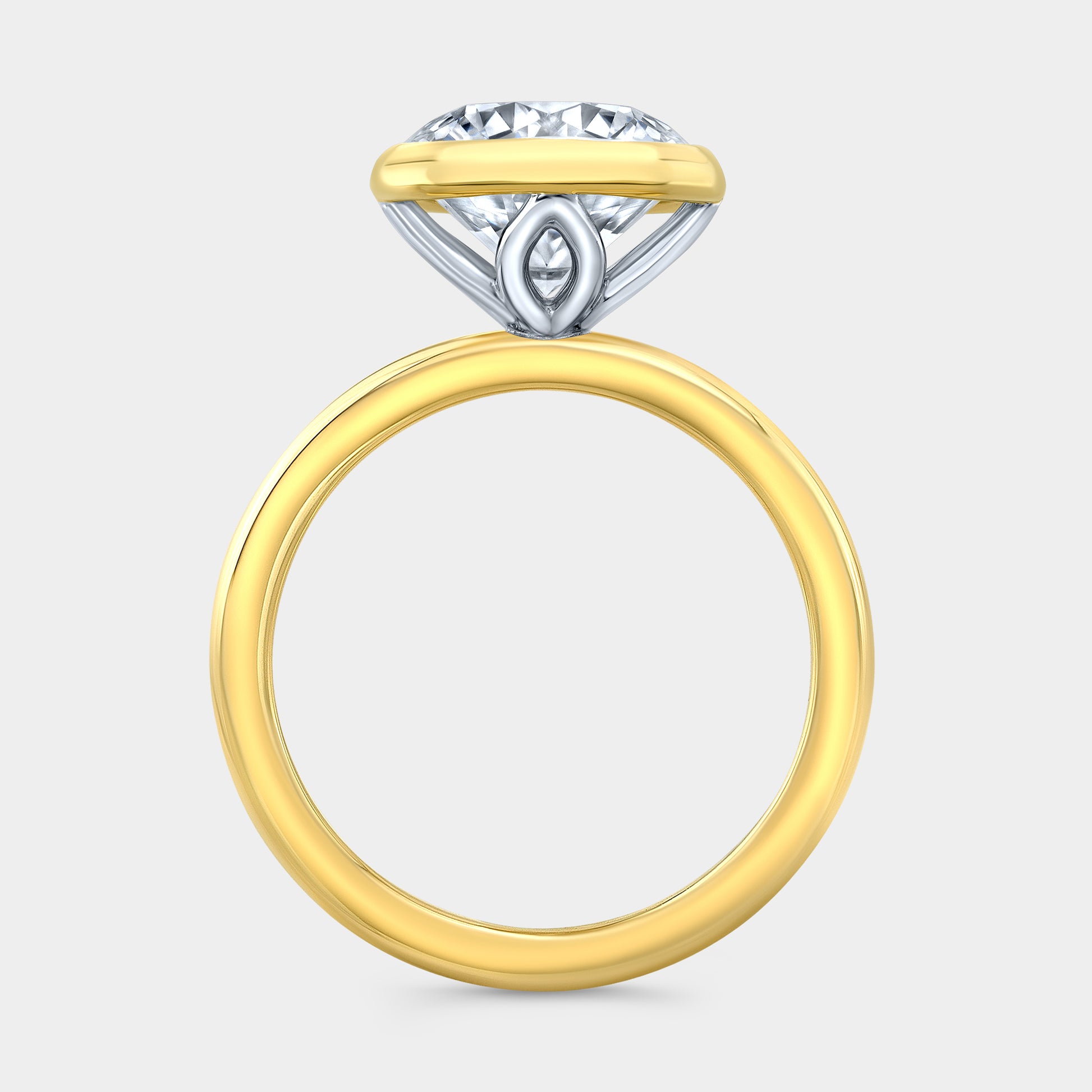 Round solitaire ring, yellow gold & platinum, tulip bezel.