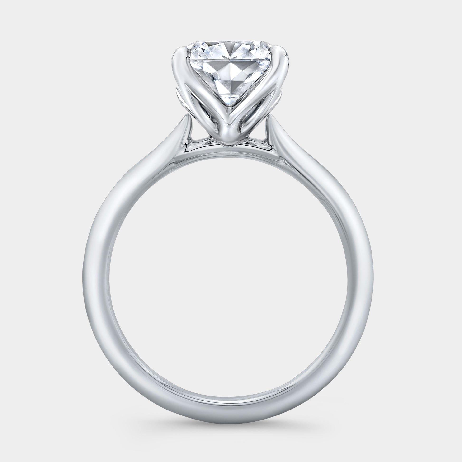 White gold ring, tulip basket, knife edge band.