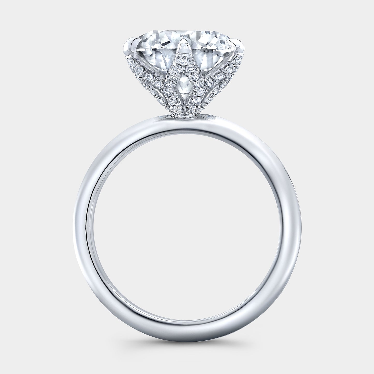 White gold ring, tulip basket and full diamond detail.