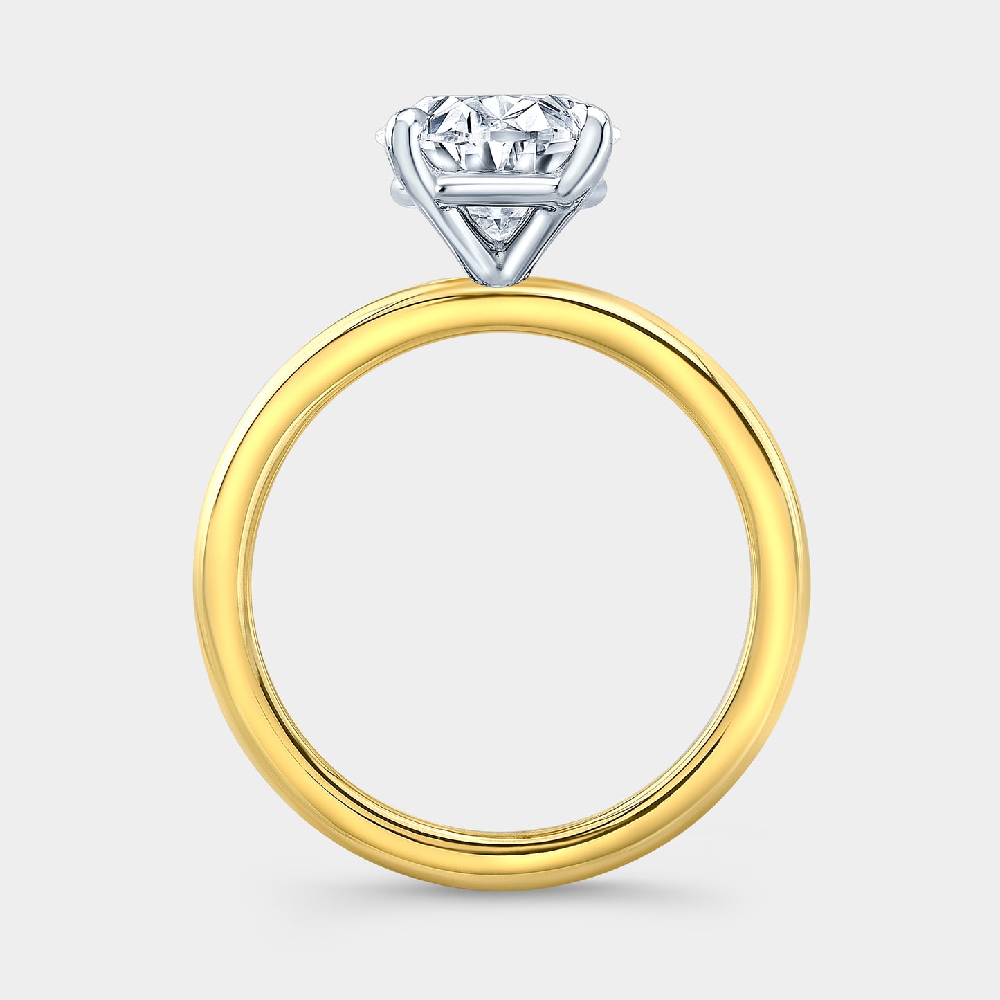 Oval solitaire ring, yellow gold & platinum.