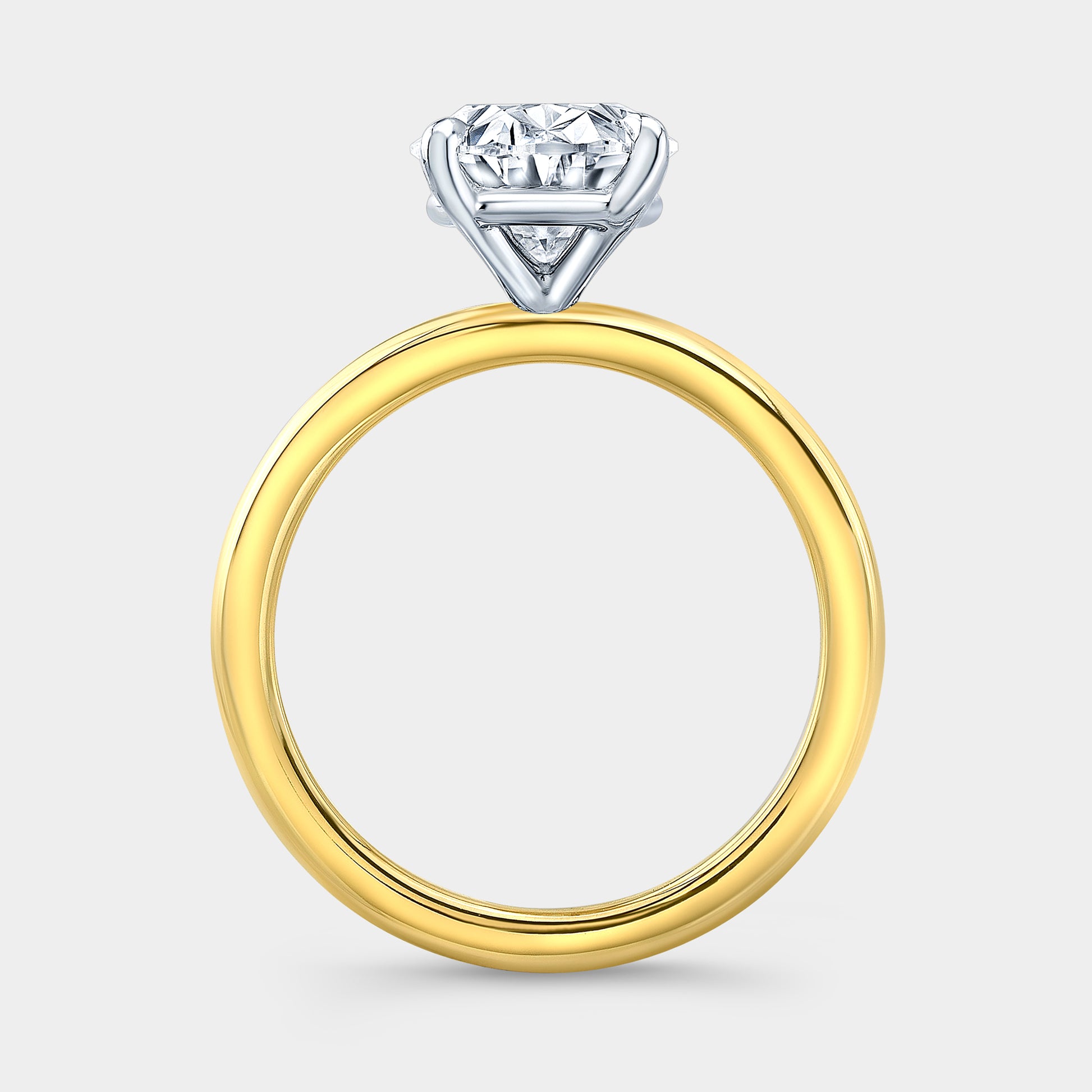 Oval solitaire ring, yellow gold & platinum.
