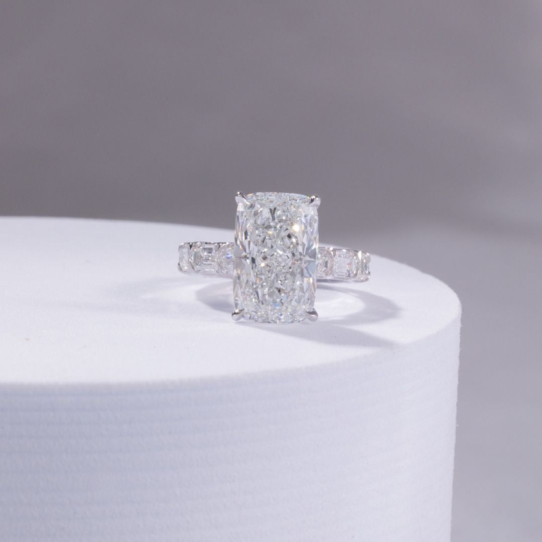 Cushion Diamond Hidden Halo East–West Emerald Cut Diamond Band Platinum Engagement Ring