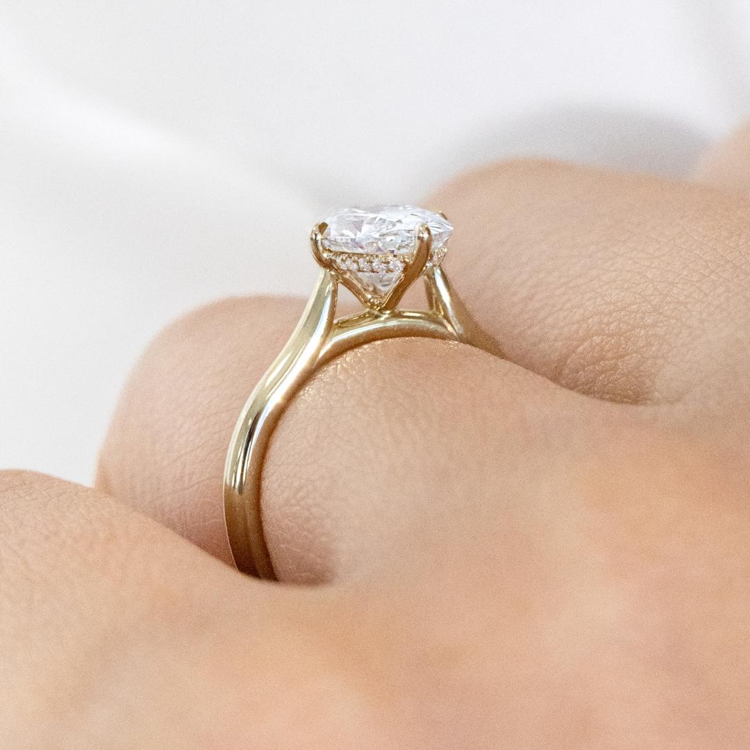 Oval Diamond North South Set Hidden Halo Tapered Cathedral Solitaire Yellow Gold Engagement Ring