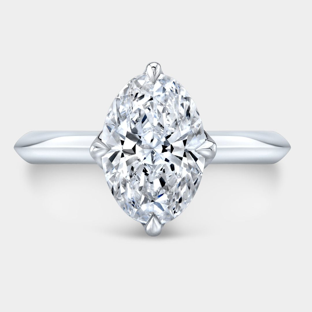 Oval Diamond North South Set Tulip Knife Edge Solitaire with Peekaboo Diamonds Platinum Engagement Ring