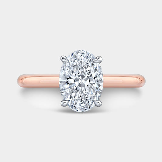 The Hailey Oval Solitaire Rose Gold And Platinum Engagement Ring