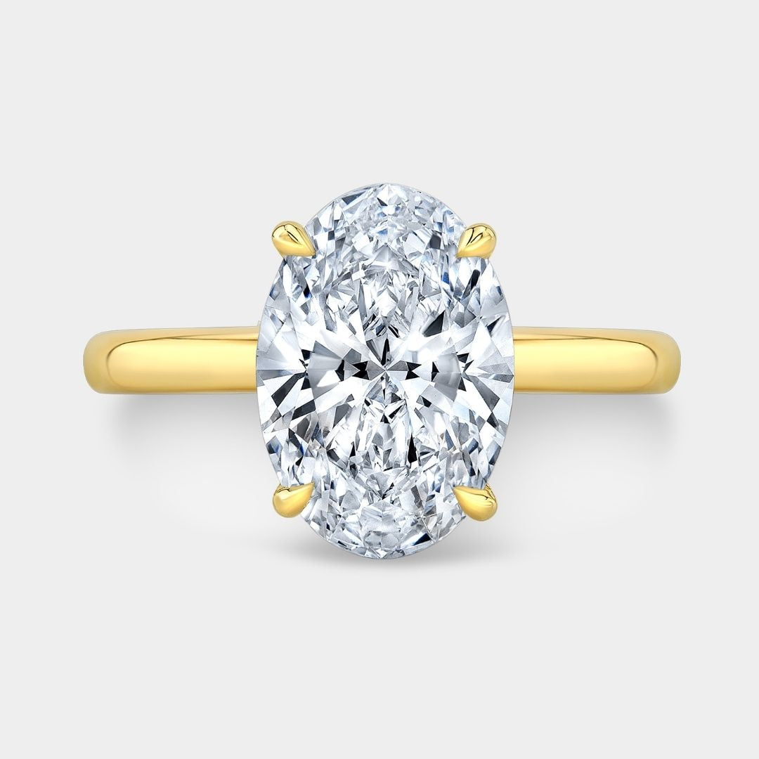 Oval Diamond Hidden Halo Solitaire Yellow Gold Engagement Ring By oval-diamond-hidden-halo-solitaire-yellow-gold-engagement-ring-by