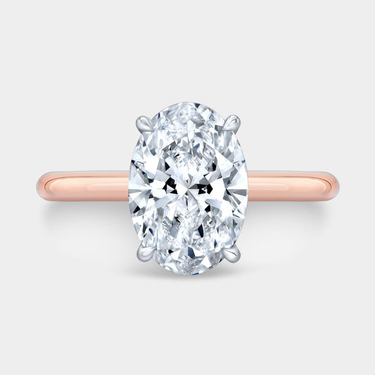 Oval Diamond Solitaire Rose Gold And Platinum Engagement Ring