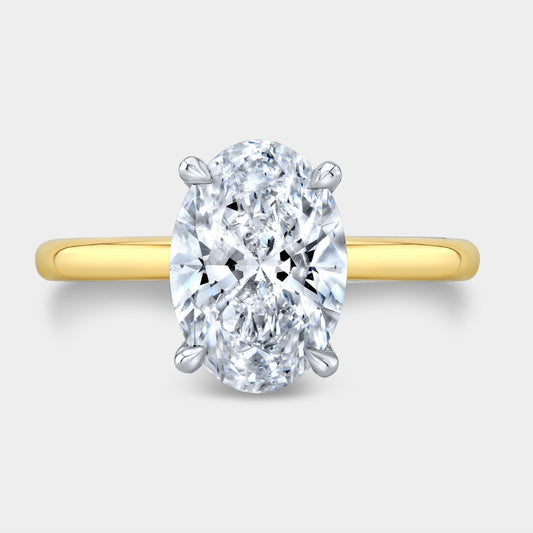 Oval Diamond Solitaire Yellow Gold And Platinum Engagement Ring