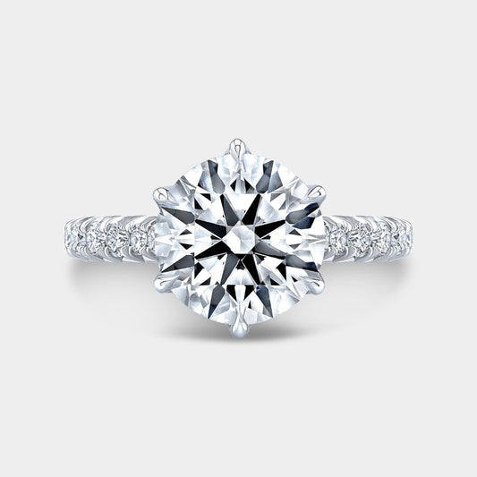 Round Diamond Tulip With Peekaboo And Diamond Bridge French Pave Platinum Engagement Ring