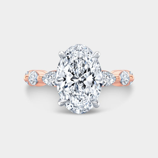 Oval Diamond with Marquise Side Stones Rose Gold And Platinum Engagement Ring