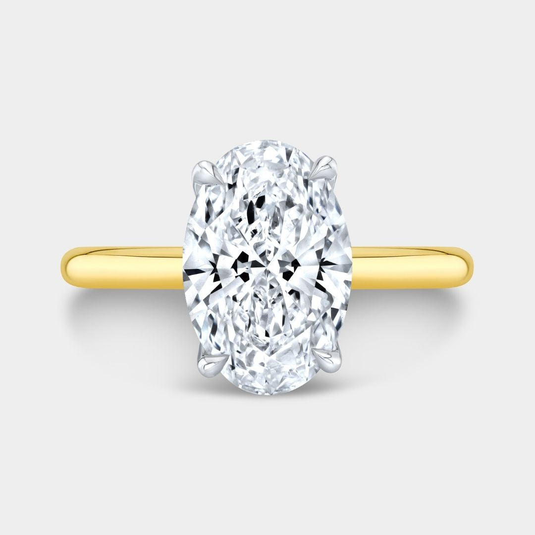 Oval Diamond Tulip Basket Tapered Cathedral Solitaire Yellow Gold And Platinum Engagement Ring